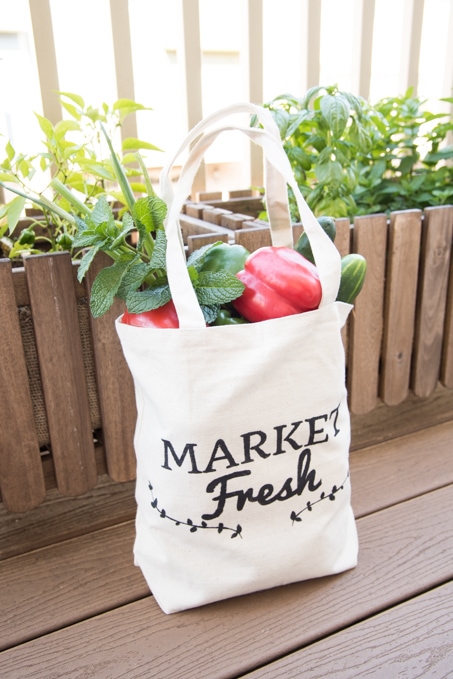 exterior image Farmer's market tote bag done with some vegetables inside
